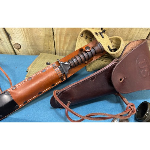 223 - A Collection of military collectables; British Army Falklands era round belt, 19th century Morroco l... 