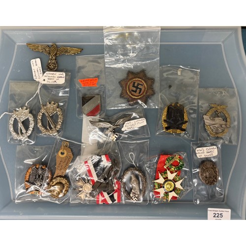 225 - A Tray containing a collection of German Military badges; WW2 German wound badge, WW2 Luftwaffe reti... 