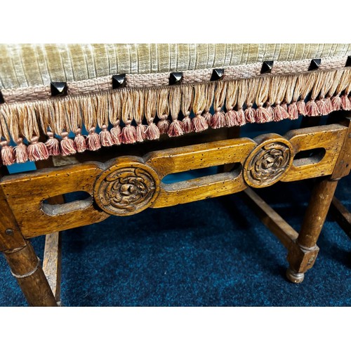 285 - Two 18th century Italian Baroque style Walnut Arm Chairs. Both having carved support stretcher.