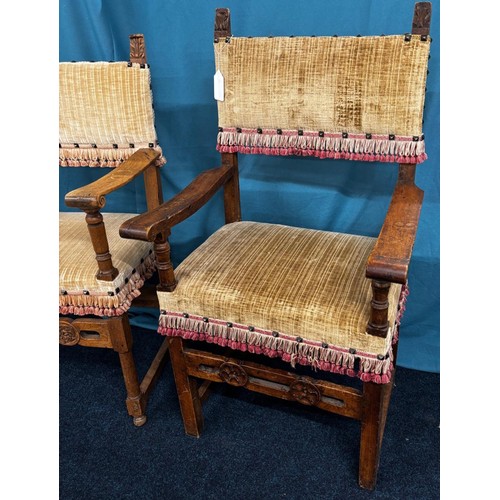 285 - Two 18th century Italian Baroque style Walnut Arm Chairs. Both having carved support stretcher.