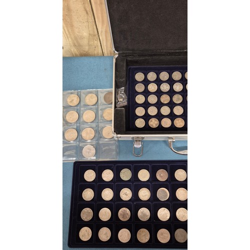 67 - Case containing Two Shillings, One Florins, Crowns, half crowns and others.