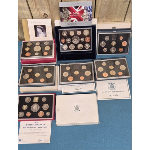 60 - A Collection of Royal Mint  Great Britians decimal coins sets throughout the years; 2006 proof coin ... 