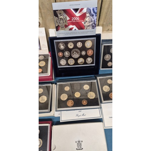 60 - A Collection of Royal Mint  Great Britians decimal coins sets throughout the years; 2006 proof coin ... 