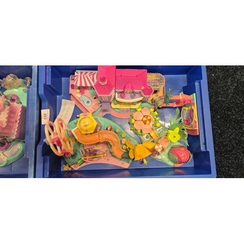 303 - Four trays of Polly pocket play sets and figures.