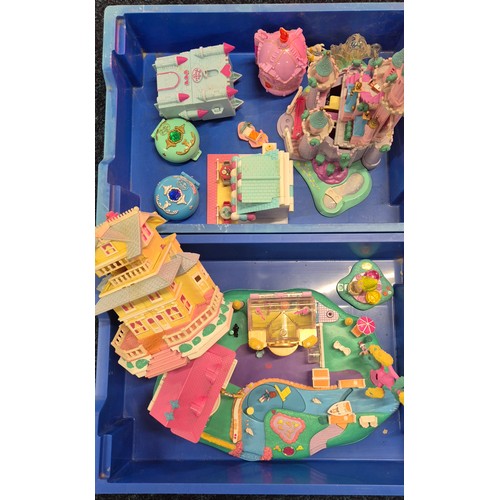303 - Four trays of Polly pocket play sets and figures.