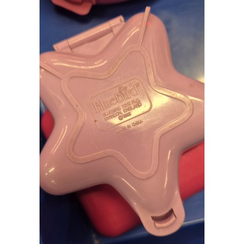 303 - Four trays of Polly pocket play sets and figures.