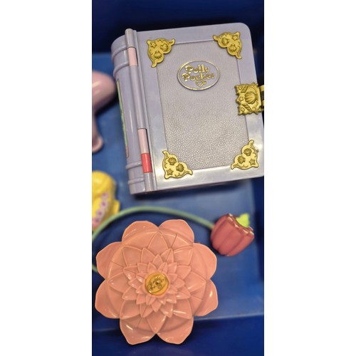 303 - Four trays of Polly pocket play sets and figures.