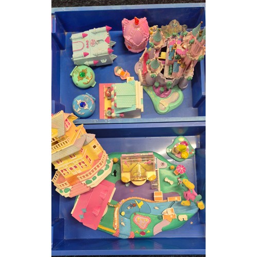 303 - Four trays of Polly pocket play sets and figures.