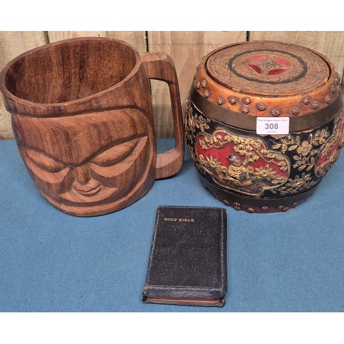 308 - 1920's Chinese wood and lacquered lidded rice barrel decorated with relief gilt figures and foliage.... 