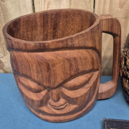 308 - 1920's Chinese wood and lacquered lidded rice barrel decorated with relief gilt figures and foliage.... 