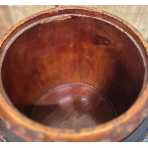 308 - 1920's Chinese wood and lacquered lidded rice barrel decorated with relief gilt figures and foliage.... 