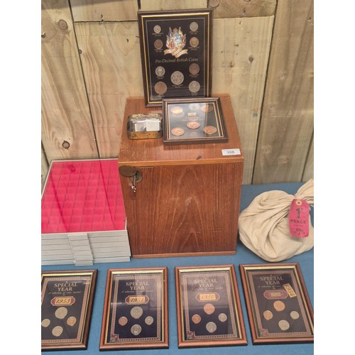 306 - Crate of coin protectors and coins; Teak multi drawer coin chest with key. Various coin protector st... 