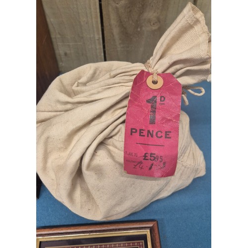 306 - Crate of coin protectors and coins; Teak multi drawer coin chest with key. Various coin protector st... 