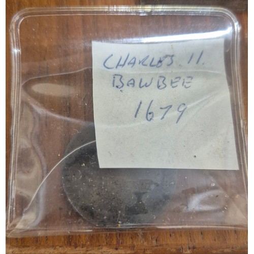 306 - Crate of coin protectors and coins; Teak multi drawer coin chest with key. Various coin protector st... 