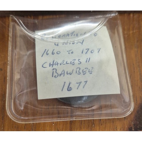 306 - Crate of coin protectors and coins; Teak multi drawer coin chest with key. Various coin protector st... 