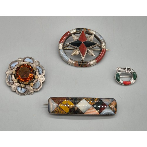 73 - A lot of four Victorian and later Scottish agate brooches.
