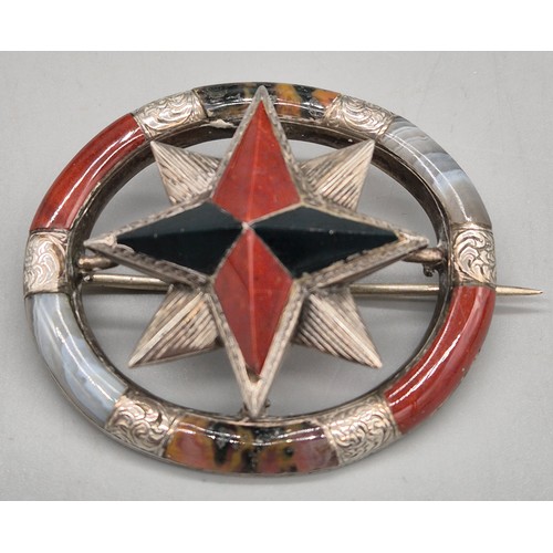 73 - A lot of four Victorian and later Scottish agate brooches.