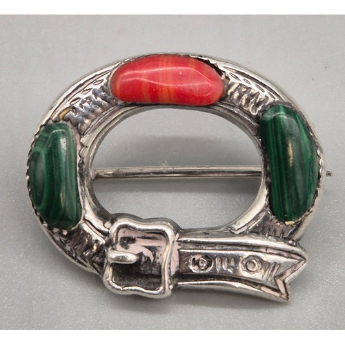 73 - A lot of four Victorian and later Scottish agate brooches.