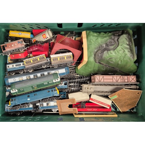 396 - Three crates of Hornby and train related items; Hornby Diesel locos, carriages, wagons, track and ac... 