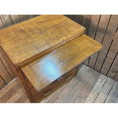 406 - Military style oak four drawer chest with pull out writing area. Was taken from the RMS Mauritania (... 