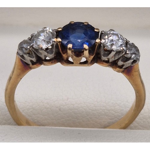 80 - 18ct yellow gold blue topaz and diamond stone ring. Round cut topaz and four round cut diamonds. 0.2... 
