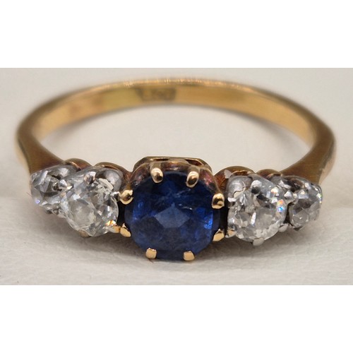 80 - 18ct yellow gold blue topaz and diamond stone ring. Round cut topaz and four round cut diamonds. 0.2... 