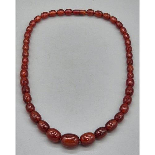 82 - Vintage Bakelite Cherry Amber Graduating Bead Necklace. 56.87grams.