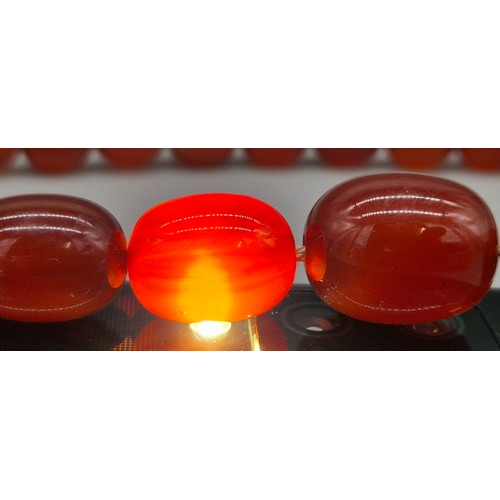 82 - Vintage Bakelite Cherry Amber Graduating Bead Necklace. 56.87grams.