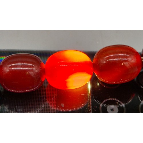 82 - Vintage Bakelite Cherry Amber Graduating Bead Necklace. 56.87grams.