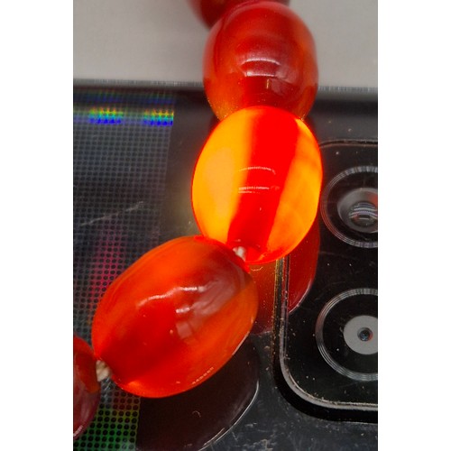 82 - Vintage Bakelite Cherry Amber Graduating Bead Necklace. 56.87grams.