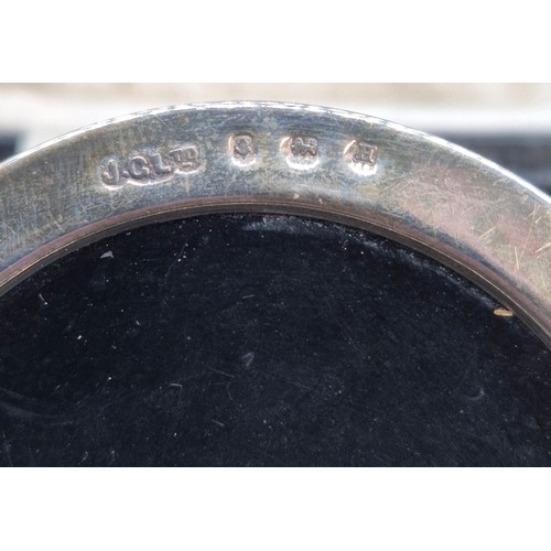 76 - A Boxed Birmingham Silver three piece condiment set with two silver spoons.