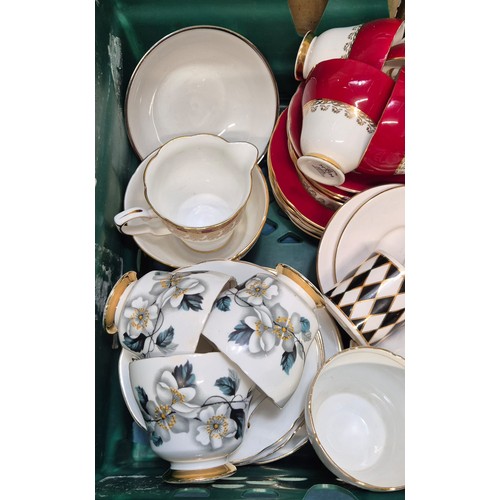 386 - Crate of porcelain tea sets; Royal Tuscan M.Kirkwood design tea set, Royal Staffordshire tea wares a... 