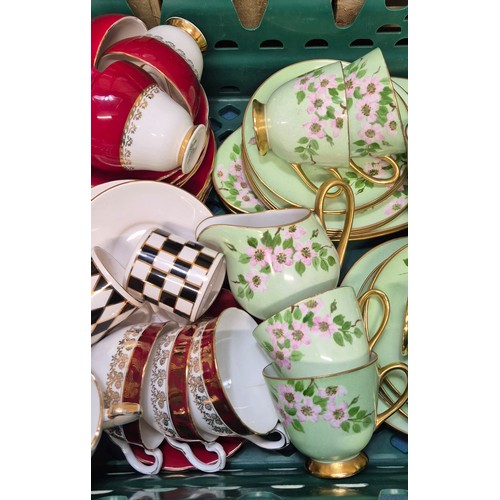 386 - Crate of porcelain tea sets; Royal Tuscan M.Kirkwood design tea set, Royal Staffordshire tea wares a... 