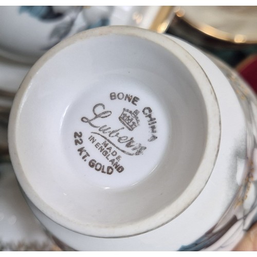 386 - Crate of porcelain tea sets; Royal Tuscan M.Kirkwood design tea set, Royal Staffordshire tea wares a... 