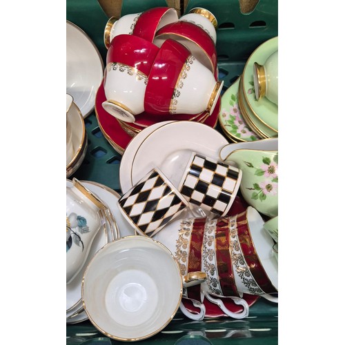 386 - Crate of porcelain tea sets; Royal Tuscan M.Kirkwood design tea set, Royal Staffordshire tea wares a... 