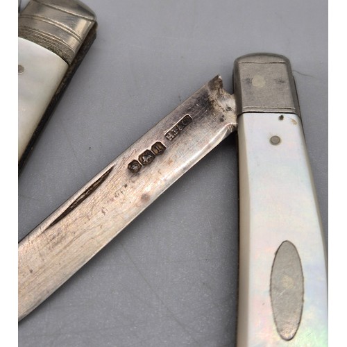 79 - A Selection of silver items; Three silver and mother of pearl fruit knives. Edinburgh silver tea cad... 