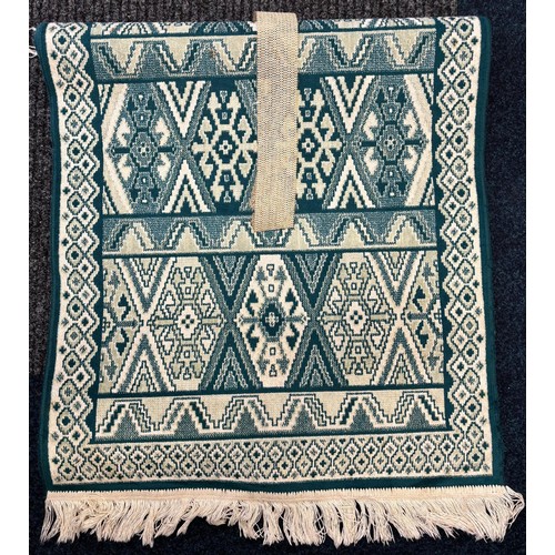 388 - Case containing vintage clothing; Victorian Mourning bonnet, fur stoles, black skirt and small rug.