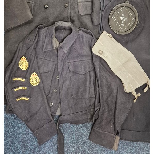 429 - A Case containing Military Clothing. Gators, Kangol wear limited 1961 Beret, Warden and Civil Defenc... 