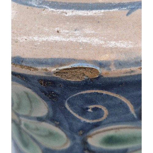 438 - A Sicilian Maiolica Albarello. 17th/ 18th century. 24cm high.