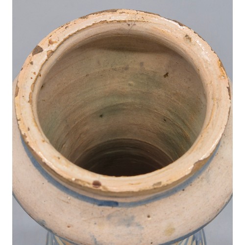 438 - A Sicilian Maiolica Albarello. 17th/ 18th century. 24cm high.