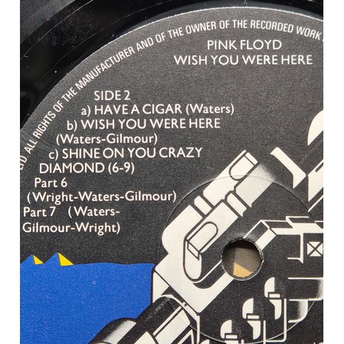 597 - A Bundle of records to include 1st pressing of Pink Floyd wish you were here album A1/ B3, also incl... 