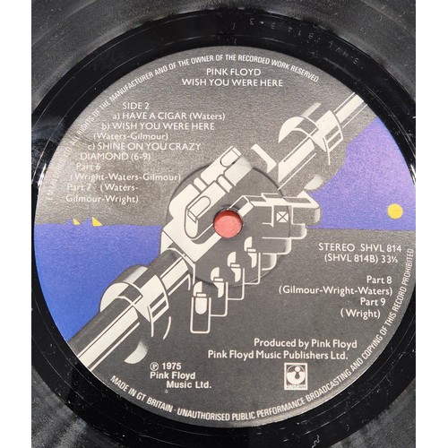 597 - A Bundle of records to include 1st pressing of Pink Floyd wish you were here album A1/ B3, also incl... 