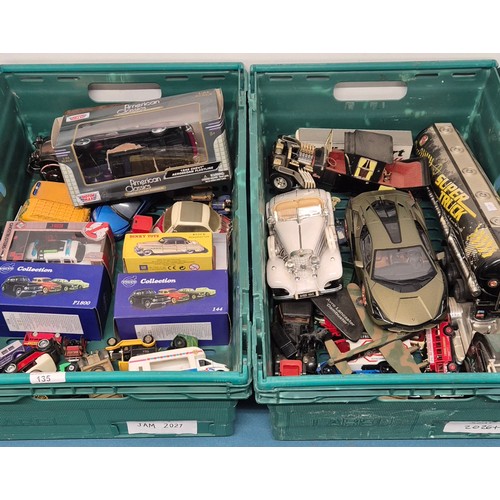 135 - Two crates of model vehicles; boxed Dinky model, Ghost Busters boxed model, Maisto and Volvo collect... 
