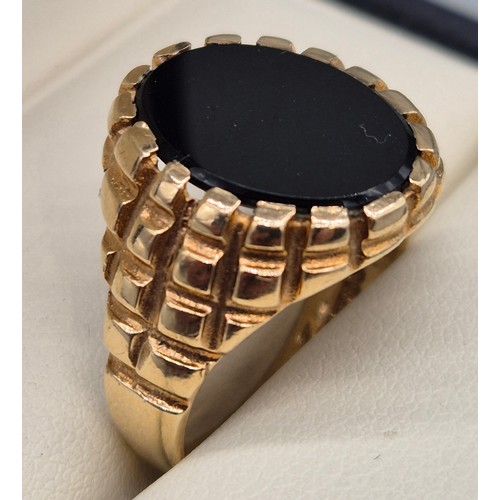4 - 9ct yellow gold and onyx signet ring. Ring size U. 8.13Grams.