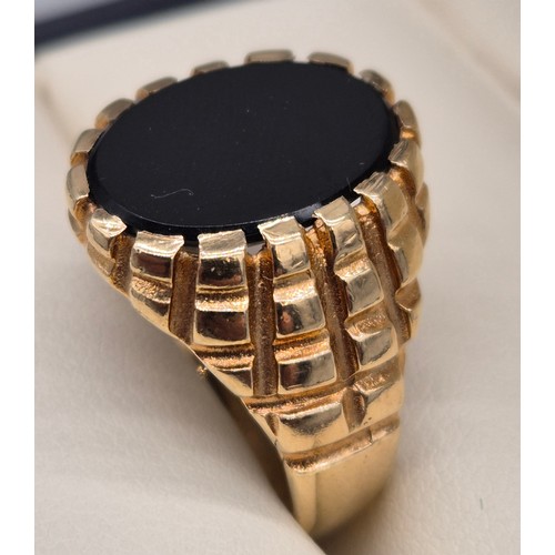 4 - 9ct yellow gold and onyx signet ring. Ring size U. 8.13Grams.