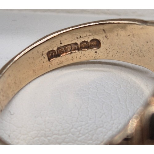 4 - 9ct yellow gold and onyx signet ring. Ring size U. 8.13Grams.