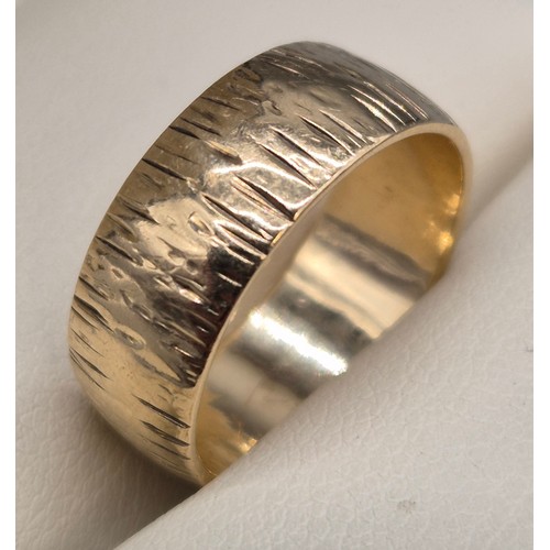 8 - Two 9ct yellow gold band rings. 9ct gold wedding band having engraved marks- ring size N. 9ct gold M... 