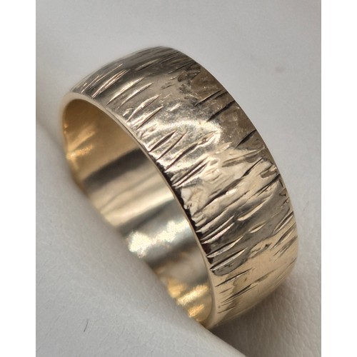 8 - Two 9ct yellow gold band rings. 9ct gold wedding band having engraved marks- ring size N. 9ct gold M... 