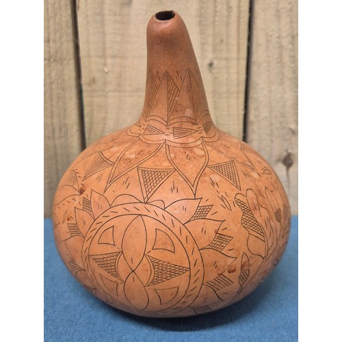 151 - Tray of collectables; hand carved calabash gourd, vintage wooden shaker box, Indo-Persian brass vase... 