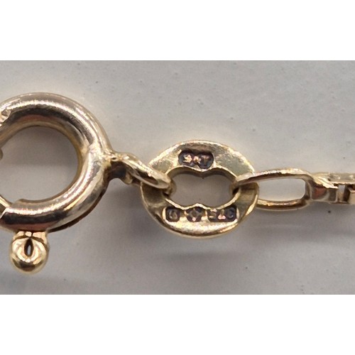 6 - 9ct yellow gold necklace fitted with white gold spheres. 5.14grams. 40cm length.